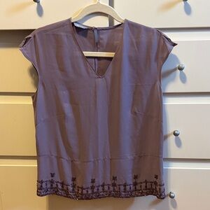 Chic Mauve Blouse with Embellished Hem